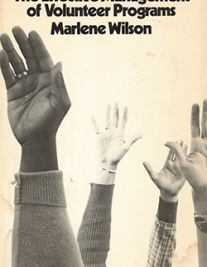 Book cover with hands raised